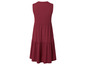 Ciemnoczerwona, bez rękawów sukienka z falbaną spódnicą.