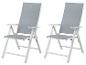 Dwa szare składane krzesła ogrodowe z białą ramą.