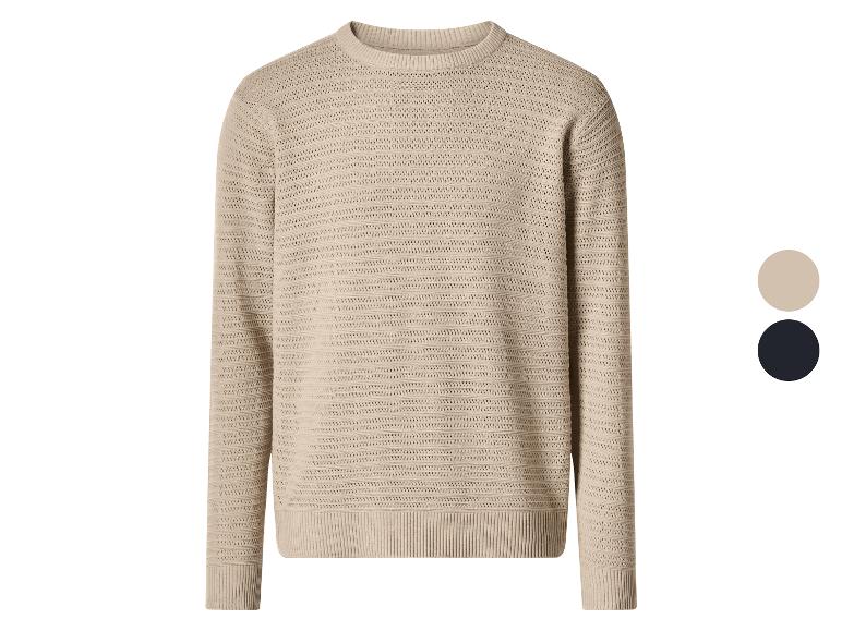 Beżowy sweter dzianinowy z dwoma próbkami kolorów: beżowym i czarnym.