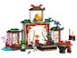 Zestaw LEGO Ninjago ze świątynią, gongiem, minifigurkami i akcesoriami treningowymi.
