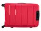 Czerwona walizka na kółkach, widok z góry.