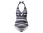 Jednoczęściowy kostium kąpielowy w czarno-białe paski z dekoltem halterowym.