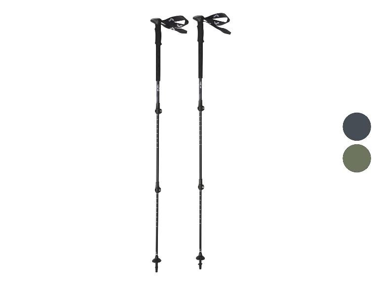 Para czarnych kijków trekkingowych z białymi paskami i detalami.