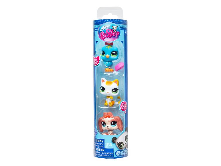 Zestaw Littlest Pet Shop z trzema figurkami zwierząt: ptakiem, kotem i szczeniakiem.