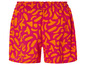 Spodnie krótkie z gumką w pasie, różowe z pomarańczowym wzorem.