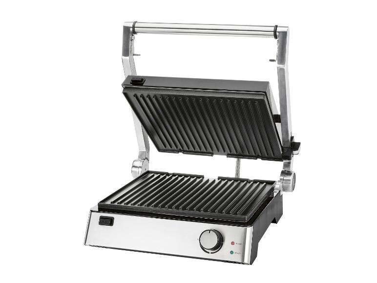 Otwarty grill elektryczny z żebrowanymi płytami grzewczymi i elementami sterującymi z przodu