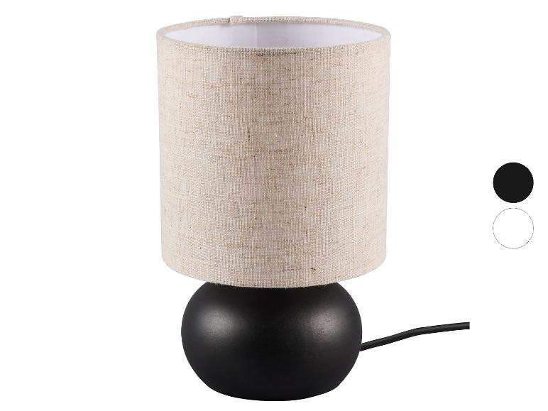 Lampa stołowa z beżowym abażurem z tkaniny i czarną podstawą, z opcjami kolorystycznymi.