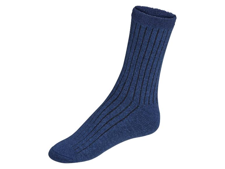 Niebieska skarpeta w pionowe paski.