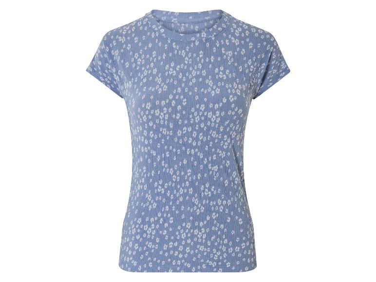 Niebieski t-shirt z białym nadrukiem kwiatów.