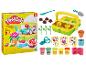 Zestaw Play-Doh Blooming Flowers z ciastoliną, narzędziami ogrodniczymi i foremkami do kwiatów.