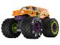 Pomarańczowy zabawkowy monster truck z dużymi kołami i fioletowymi oraz zielonymi detalami.