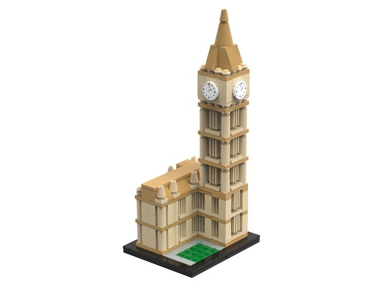 Wieża zegarowa Big Ben z beżowych i brązowych klocków konstrukcyjnych, z zegarem po każdej stronie.