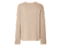 Beżowy sweter z długimi rękawami.