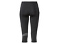 Czarne capri legginsy z wzorem w kropki.