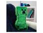 Poduszka Creeper z Minecrafta na fotelu.