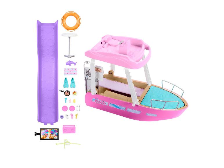 Zestaw do zabawy Barbie z różową łodzią i akcesoriami plażowymi.