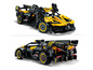 Dwa czarne i żółte LEGO Bugatti, modele samochodów wyścigowych.