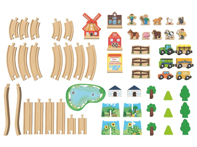 Drewniane tory kolejowe, domki, postaci i pojazdy tematyczne dla farmy.