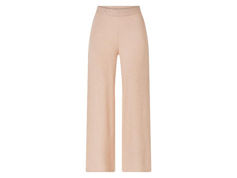 Szerokie beżowe spodnie z elastyczną talią.