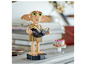 Figurkę Dobby'ego z Lego trzymającego książkę.