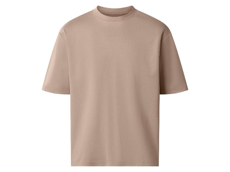 Beżowy, luźny T-shirt z krótkim rękawem.