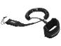 Leash surfingowy Crivit: pasek i spiralny kabel.