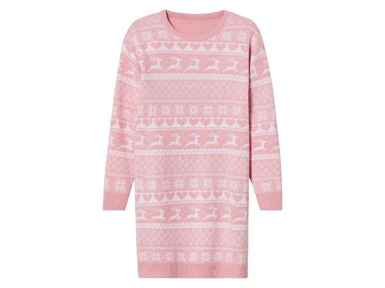 Różowy świąteczny sweter z reniferami i płatkami śniegu.