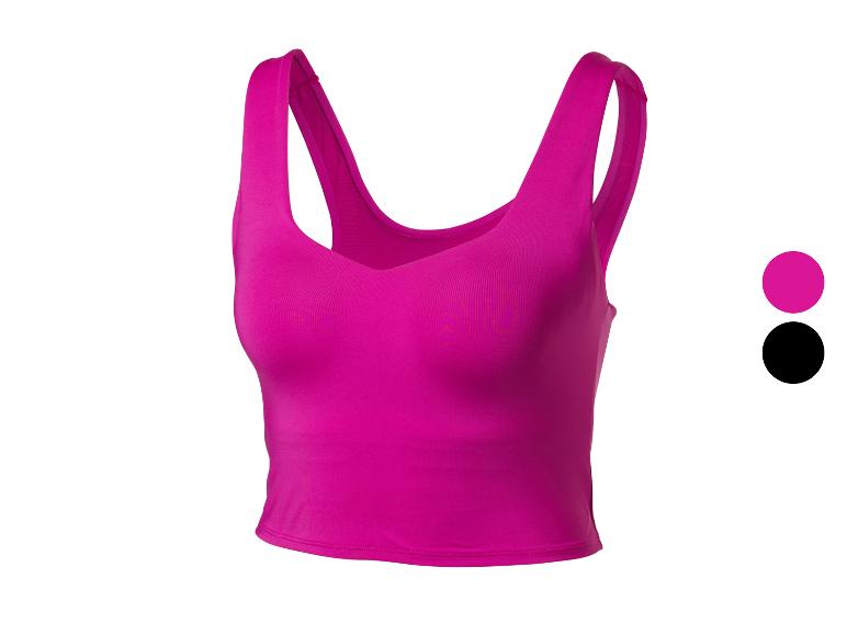 Fuksjowy sportowy crop top z szerokimi ramiączkami, w kolorach fuksji i czerni.