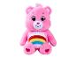 Różowy pluszowy miś Care Bear z tęczą na brzuchu.