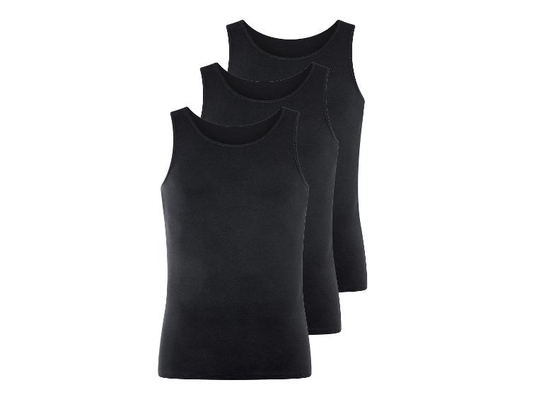 Trzy czarne tank topy.