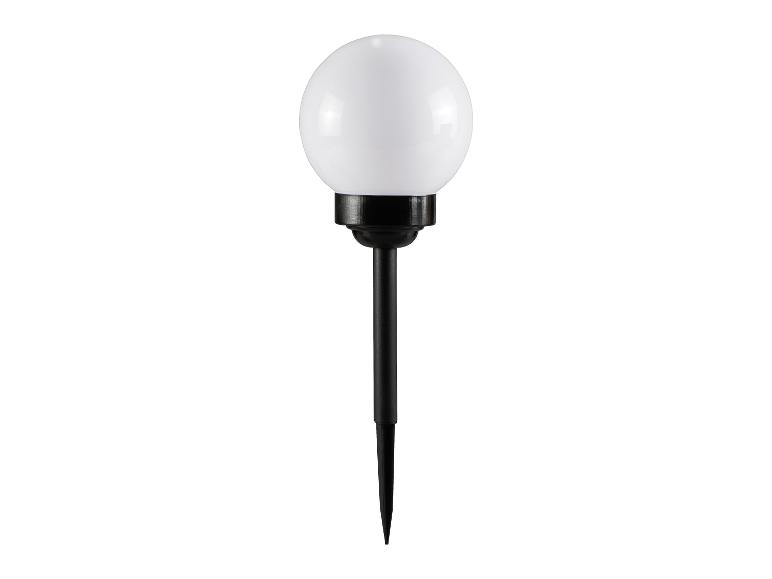 Biała kulista lampa ogrodowa z czarnym szpikulcem do oświetlenia zewnętrznego.