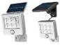 Dwie lampy solarne LED z czujnikiem ruchu, jedna ze zintegrowanym panelem, druga z oddzielnym panelem.