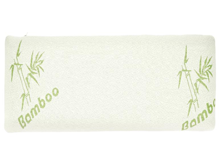Biała poduszka z zielonymi wzorami bambusa i napisem „Bamboo”.