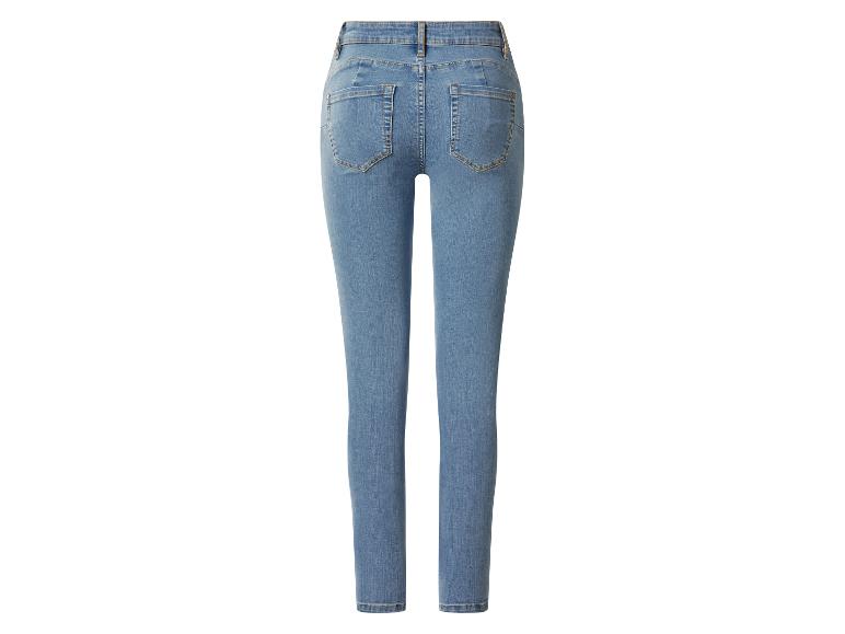 Jasnoniebieskie damskie dżinsy skinny, widok z tyłu