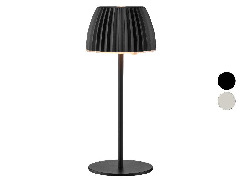 Czarna lampa stołowa z plisowanym kloszem i dwiema opcjami kolorystycznymi.