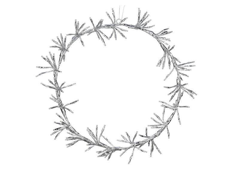 Srebrny wieniec świąteczny z lampkami LED.