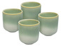 Cztery zielone, glazurowane kubki.