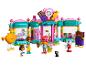 Zestaw LEGO Friends ze sklepem ze słodyczami, figurkami i akcesoriami.