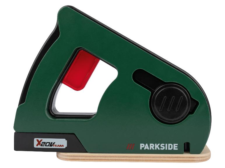 Zielona i czarna zabawka wyrzynarka z czerwonym uchwytem i logo Parkside.