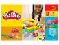 Dziecko bawi się zestawem ogrodniczym Play-Doh, tworząc kolorowe kwiaty.