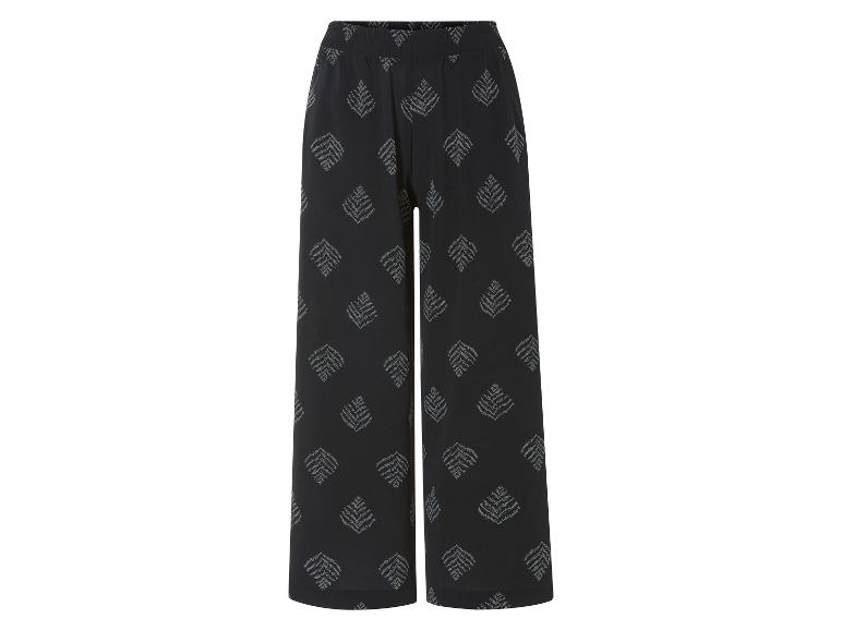 Szerokie czarne spodnie z wzorem liści.