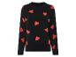 Czarny sweter z czerwonymi sercami.