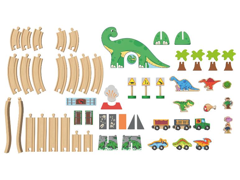 Drewniany zestaw do zabawy z motywem dinozaurów, zawierający tory kolejowe, dinozaury i akcesoria.