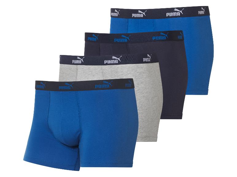 Trzy bokserki Puma: niebieskie, szare i granatowe.