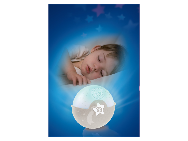 Śpiące dziecko koło łagodnej lampki nocnej z gwiazdkami.