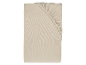 Beżowa bawełniana prześcieradło z gumką.