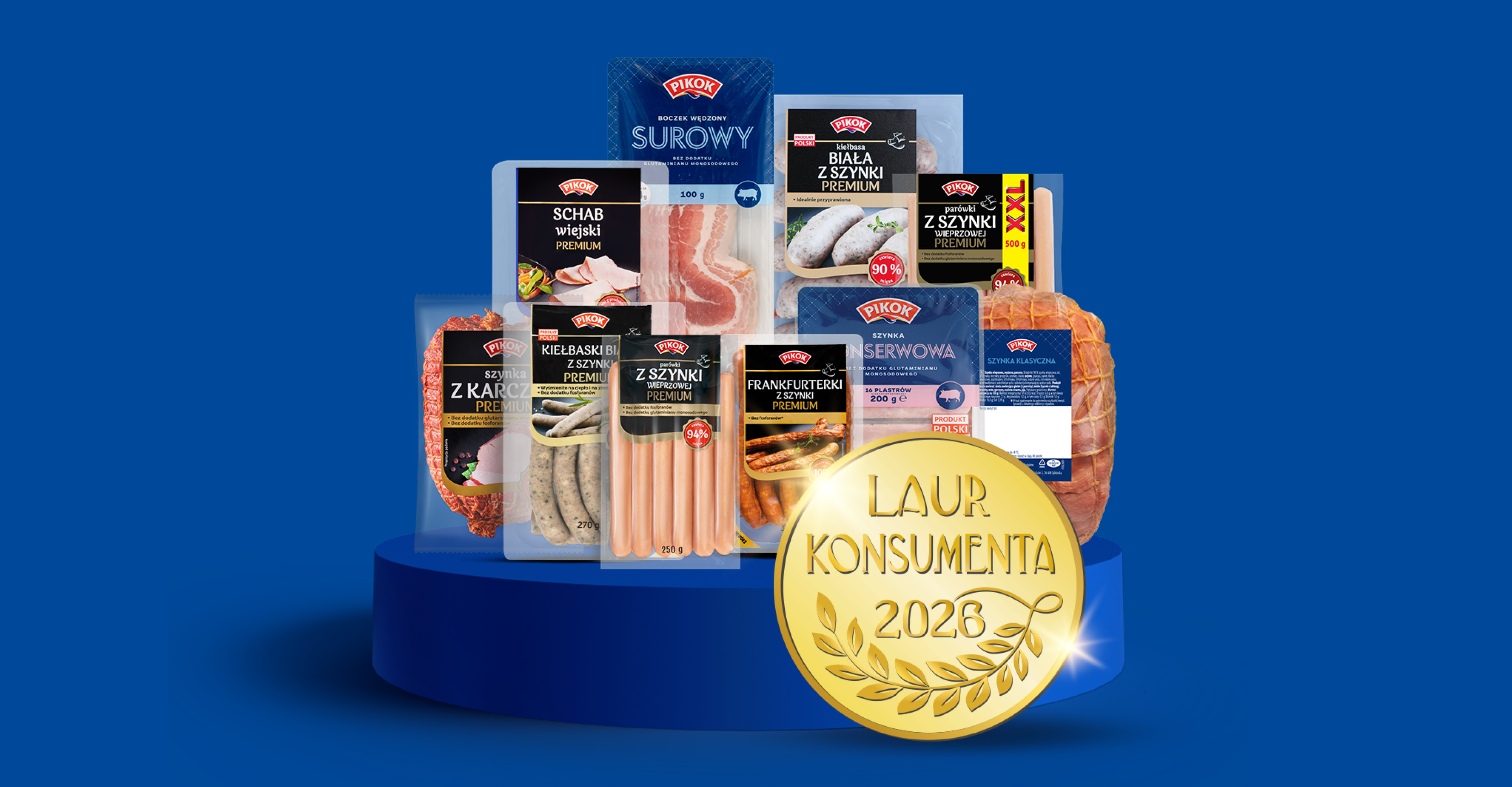 Asortyment wędlin i mięs, w tym boczek, szynka, kiełbasa i parówki, z nagrodą Laur Konsumenta 2023.