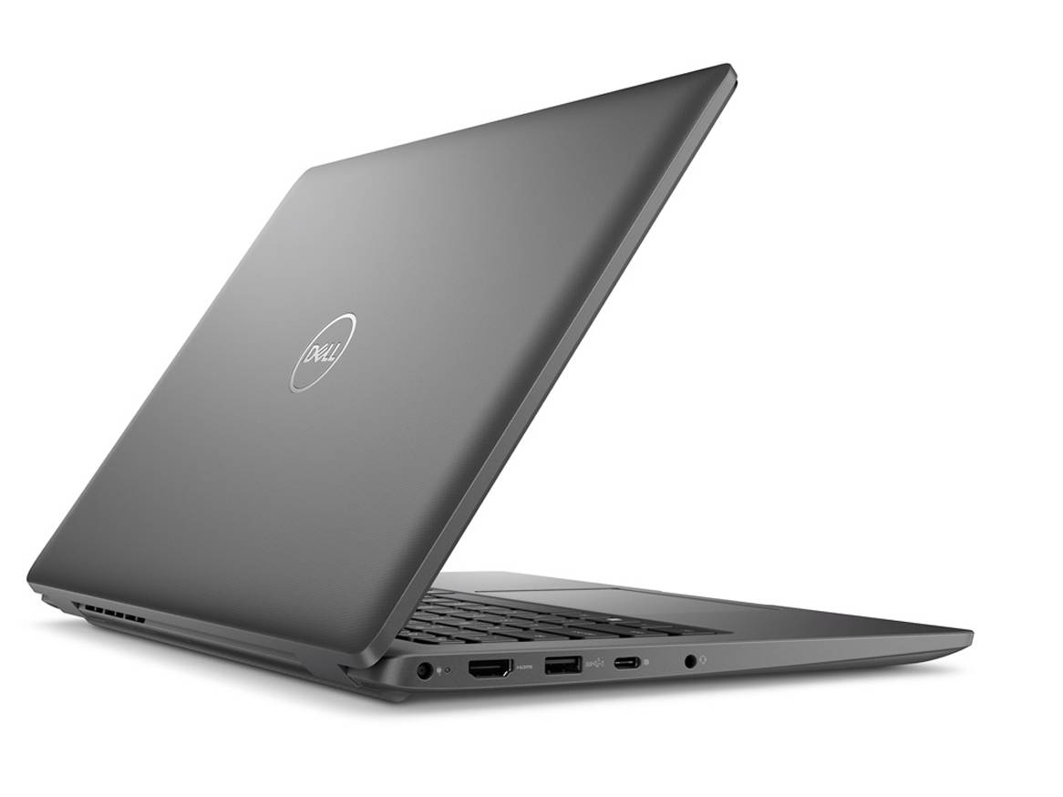 Szary laptop Dell otwarty pod kątem, ukazujący klawiaturę i porty.